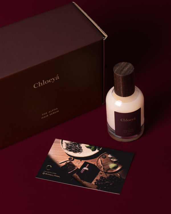 The Alpha Hair Serum bottle with its box